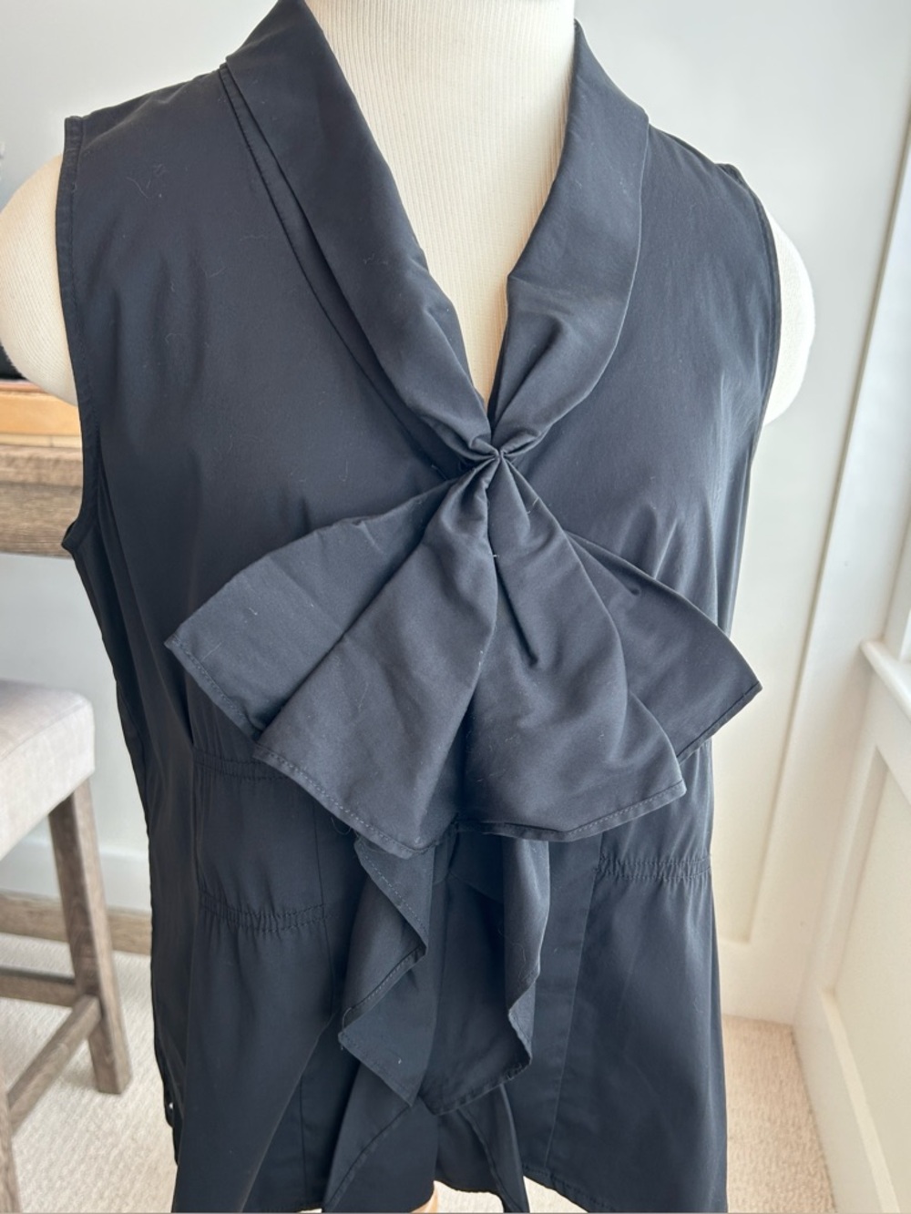 Ellen Tracy Black Sleeveless Top With Bow on the Front and Zipper Down the Back.